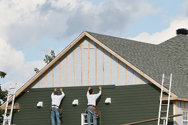 Professional Siding Installation technician working in Saluda, VA